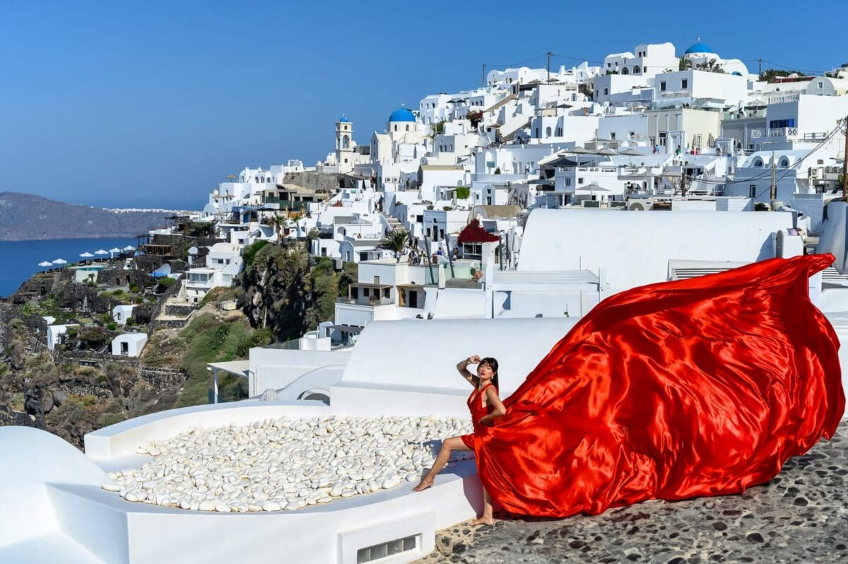 Your Flying Dress Photoshoot in Santorini – Imerovigli | Be Local Your Flying Dress Photoshoot in Santorini – Imerovigli | Be Local