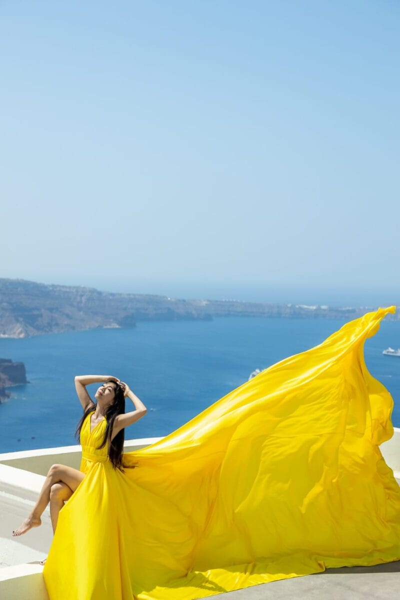 Your Flying Dress Photoshoot in Santorini – Imerovigli | Be Local Your Flying Dress Photoshoot in Santorini – Imerovigli | Be Local